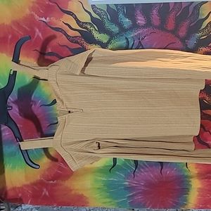 yellow tinted/tan colored shirt.